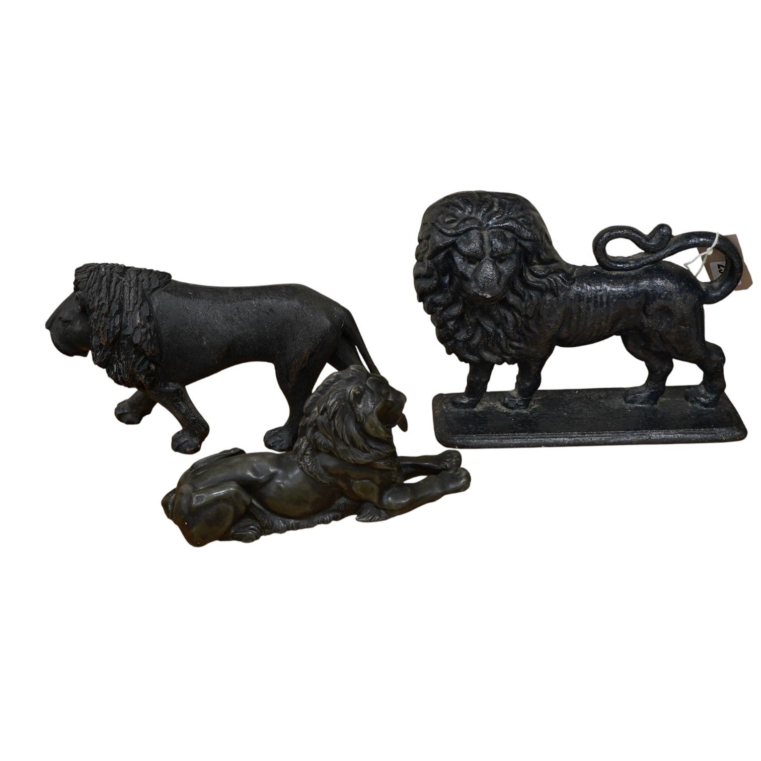 Three lion models, varying materials, and a carved wax ‘Bacchus’ wall plaque